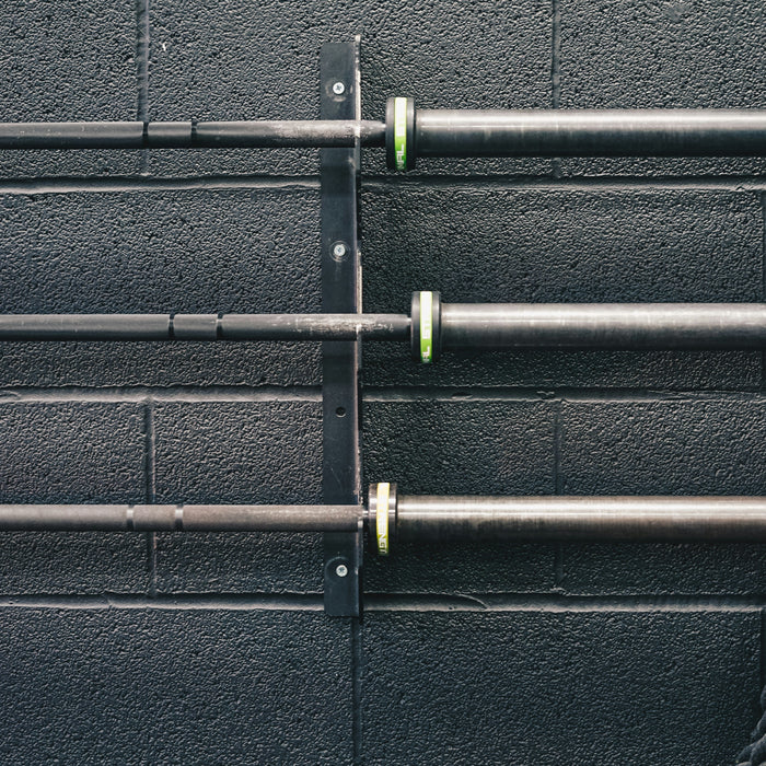 How Much Does a Smith Machine Bar Weigh? Lbs & Kg