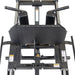A top-down close-up of the Bells of Steel Leg Press Hack Squat Machine shows its black footplate, padded handles, and safety labels. The empty 2-in-1 machine is ideal for a home gym setup.