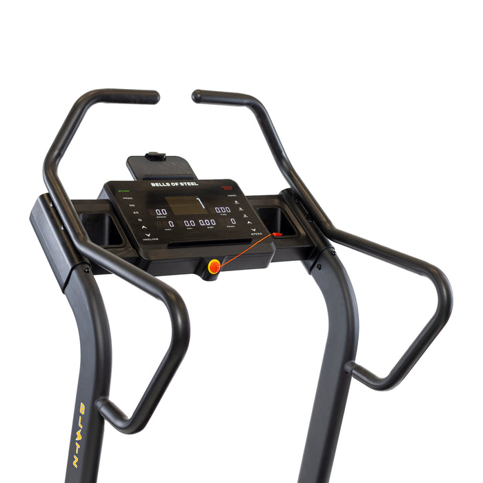 A close-up of a Bells of Steel Blitz Mountain Climber Treadmill control panel showcases a digital display with buttons, an emergency stop switch, two handlebars, Maxtuff's logo, and advanced FTMS Bluetooth for an enhanced cardio workout.